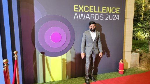 Rajesh in grey suite